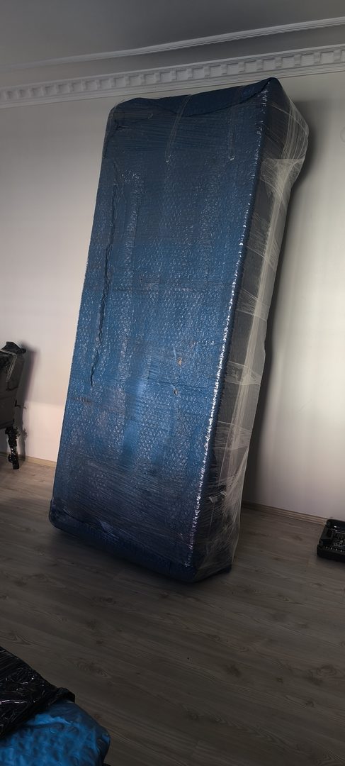 Panele sarılmış yatak taşıması